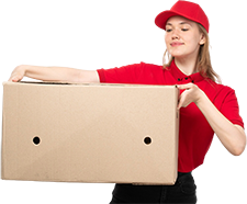 Professional mover in a red uniform carrying a moving box