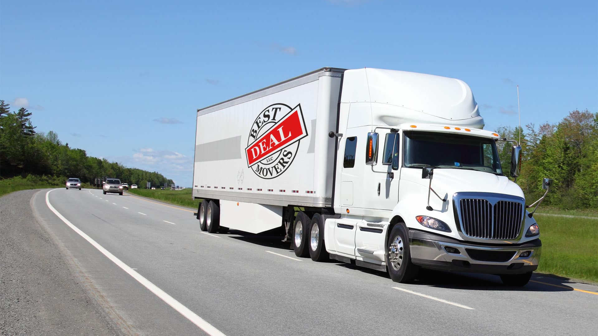 Semi-truck driving on a highway.